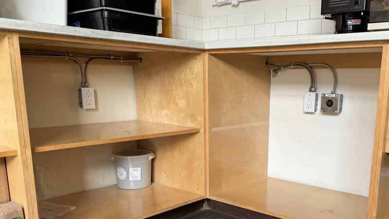 Dedicated power outlets under commercial kitchen counter